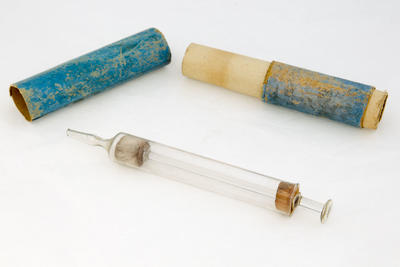 Antique glass syringe