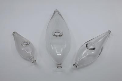 Three boat-shaped feeding bottles